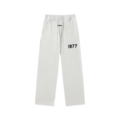 Fear Of God Essentials 1977 Graphic Straight‑Leg Sweatpants Off‑White