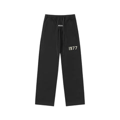 Fear Of God Essentials 1977 Graphic Straight‑Leg Sweatpants Black