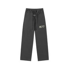 Fear Of God Essentials 1977 Graphic Straight‑Leg Sweatpants Charcoal Grey